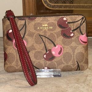 NWT Coach Corner Zip Wristlet in Signature Coated Canvas and Cherry Print CZ450